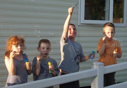 Connah, James, Tom & Hattie at Nicola's Fund Caravan in Portmadog